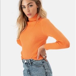 Orange turtle neck